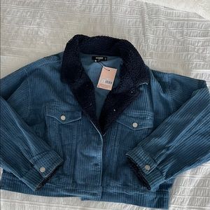 Cropped jacket.  Misguided.  New with tags